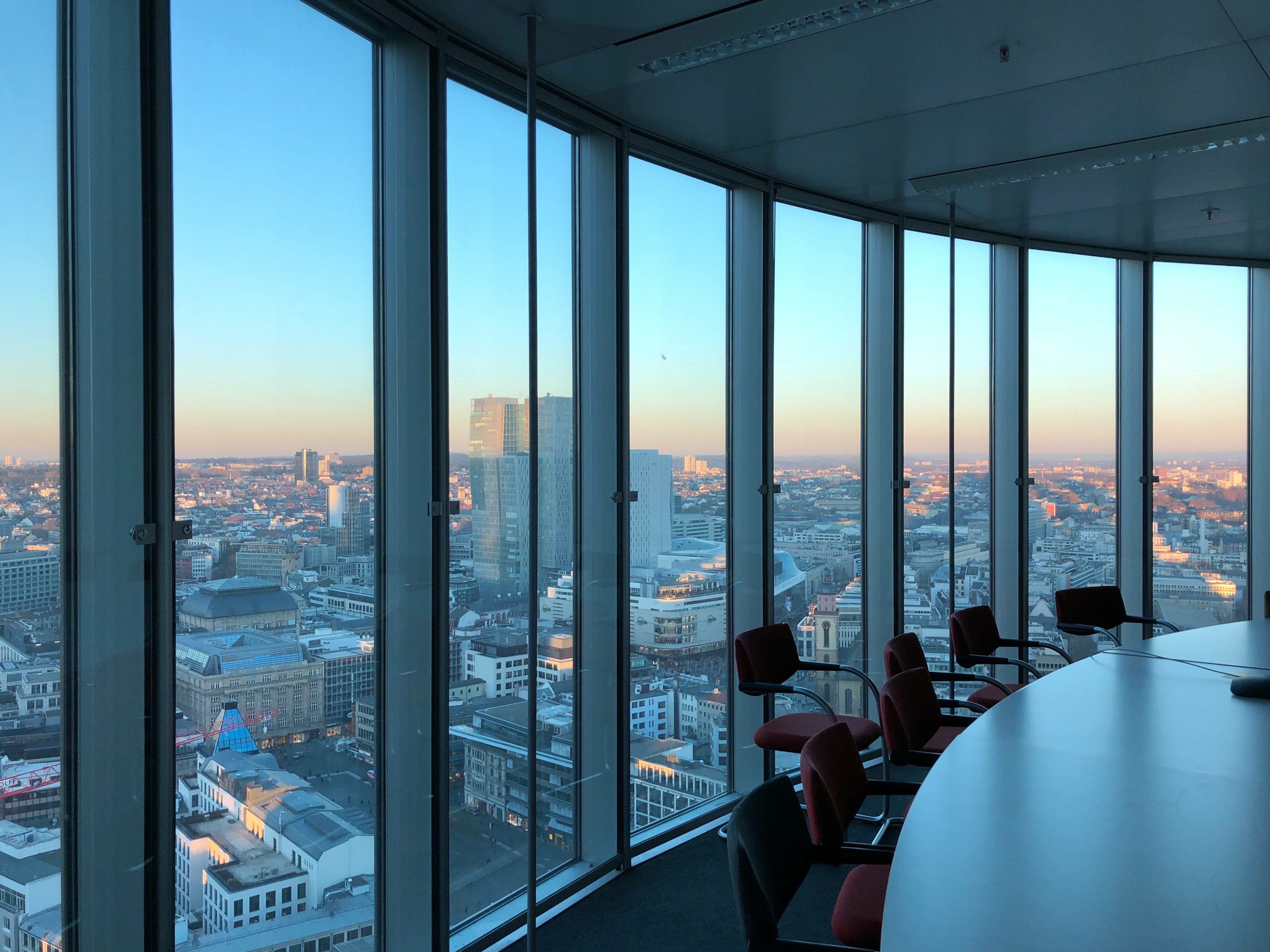 Modern professional office with large windows